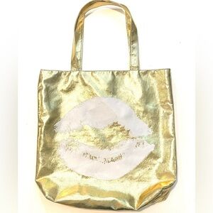 Gold tote bag.